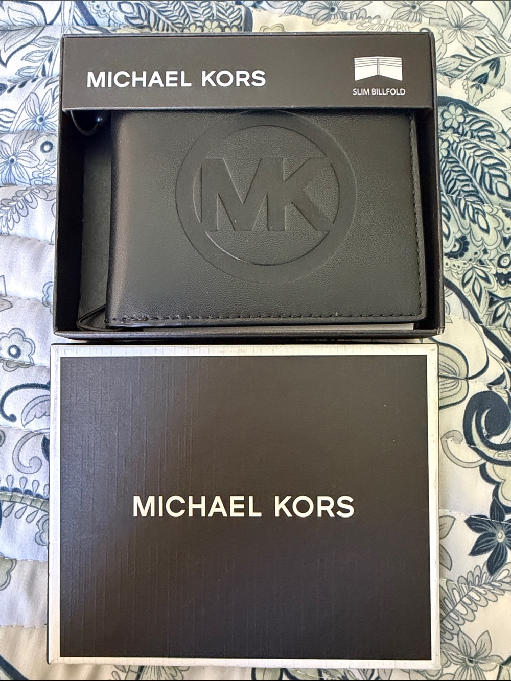 Michael Kors Black Slim Leather Billfold Wallet with Embossed MK